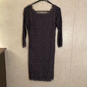 Diane von furstenberg size 4 lace midi dress with 3/4 length sleeves. Purple.